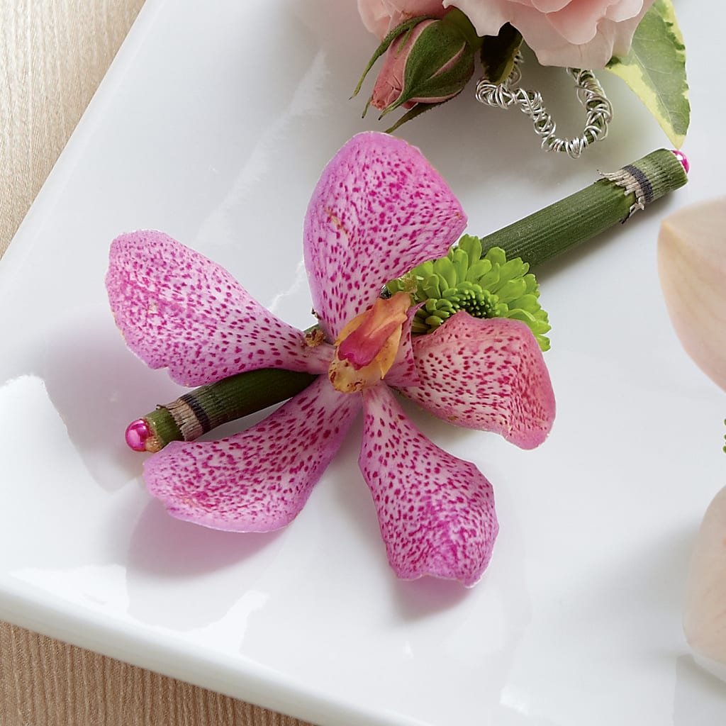 Pink Mokara Boutonniere – Parkside Flowers, Rockwell City IA